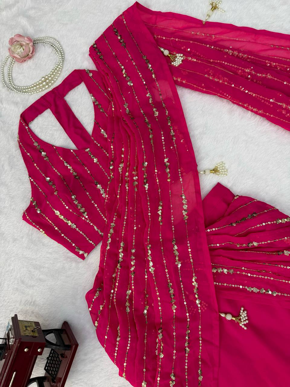 Radiant Rani Pink Silk Lehenga Choli Adorned with Opulent Heritage Floral Motifs and Intricate Zari Borders